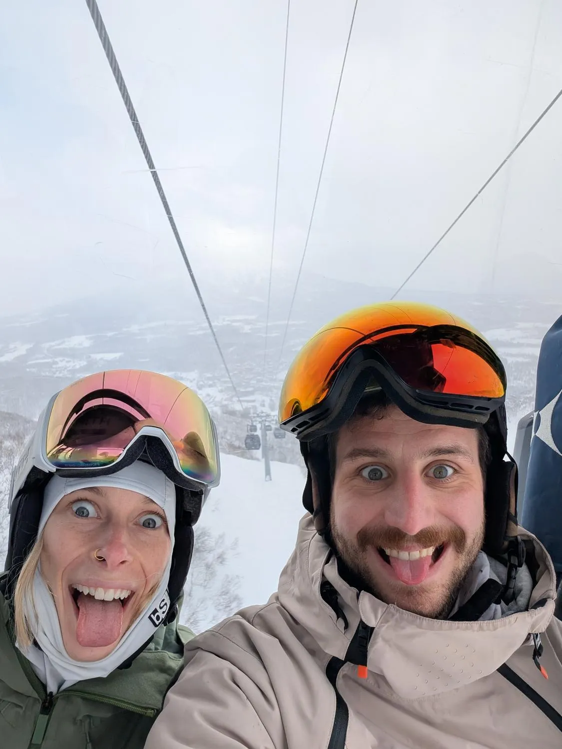 Sean and Ashley clowning around in ski gear in Japan.